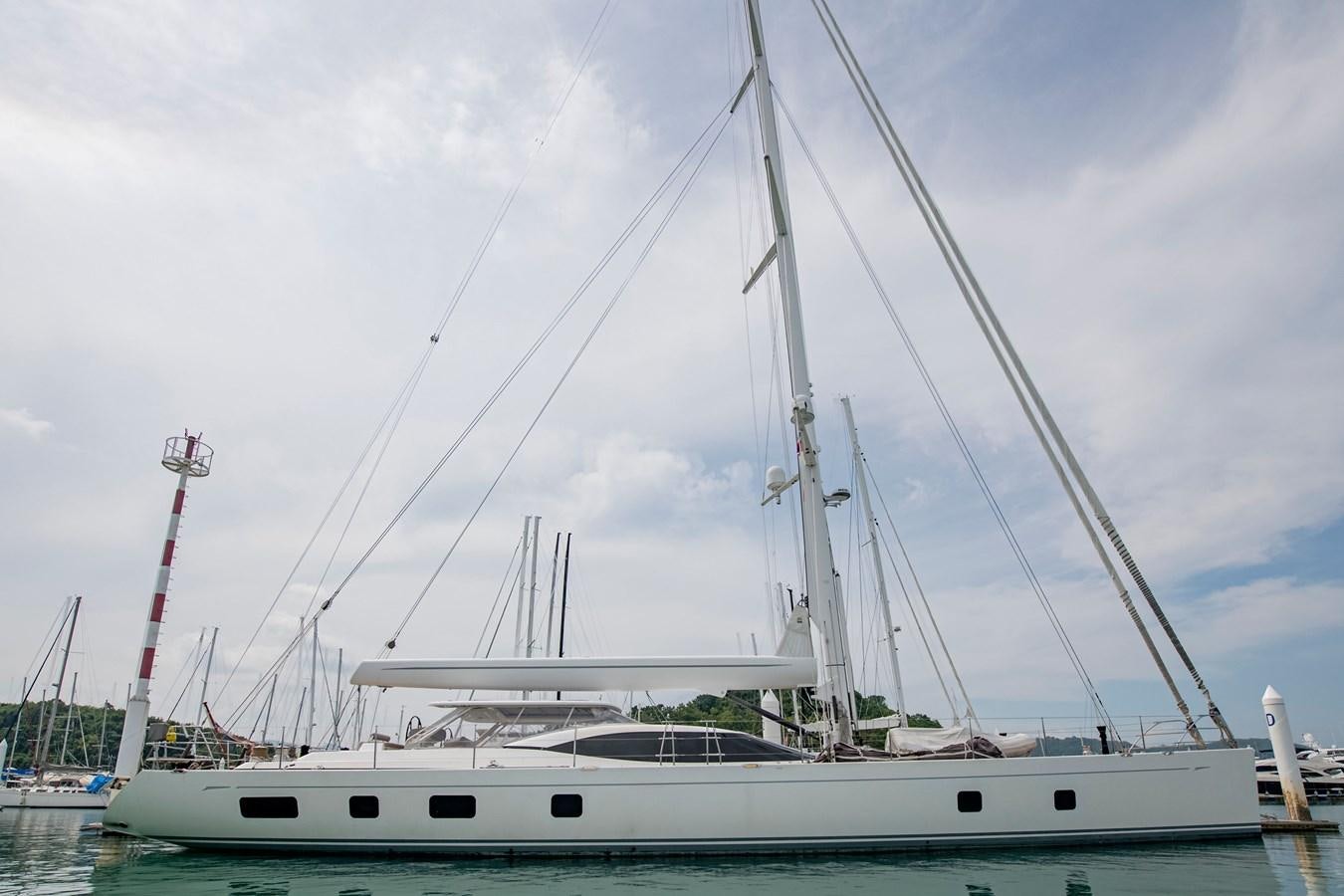 a white boat in the water aboard SERAFIM Yacht for Sale