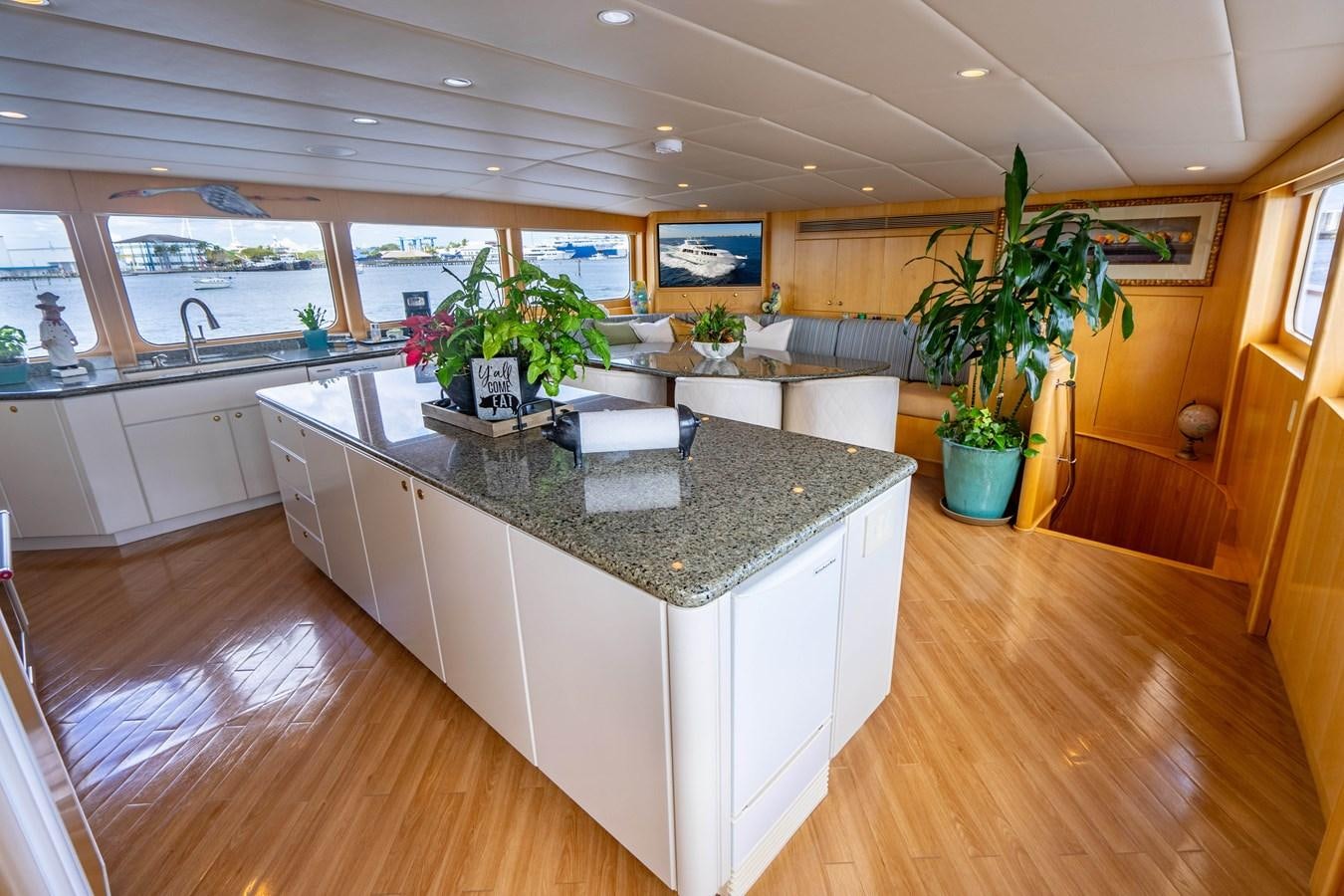 a large kitchen with a large island aboard SEA DREAMS Yacht for Sale
