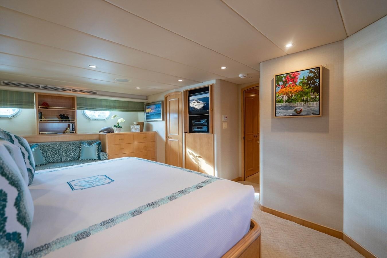 a bedroom with a large bed aboard SEA DREAMS Yacht for Sale