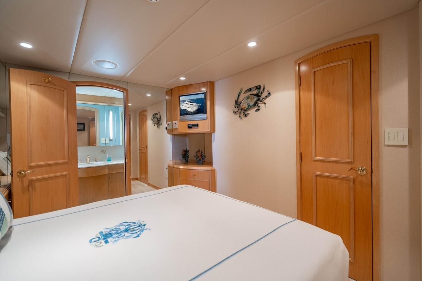 a bedroom with a bed aboard SEA DREAMS Yacht for Sale