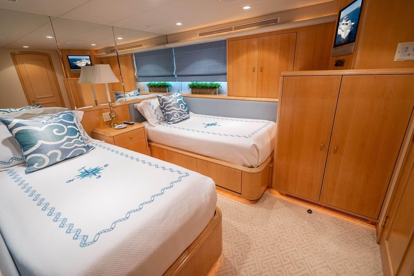 a couple of beds in a hotel room aboard SEA DREAMS Yacht for Sale
