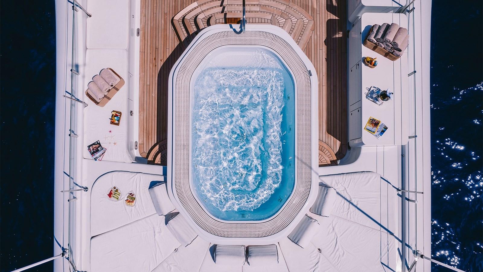 a window with a view of the earth aboard ARIELA Yacht for Sale