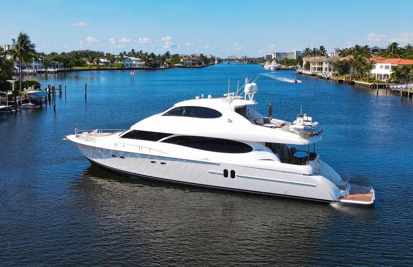 a white yacht in the water aboard NEW HORIZON Yacht for Sale