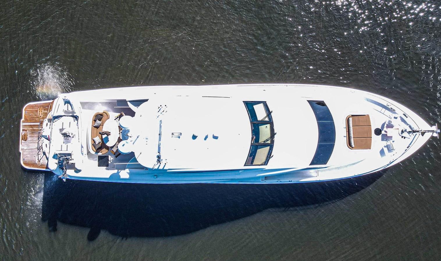 a blue and white boat aboard NEW HORIZON Yacht for Sale