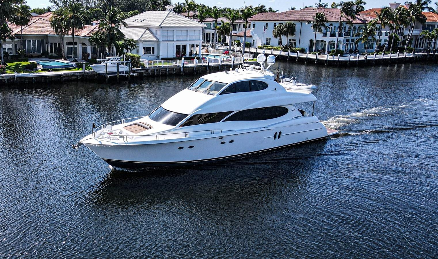 a white boat on water aboard NEW HORIZON Yacht for Sale