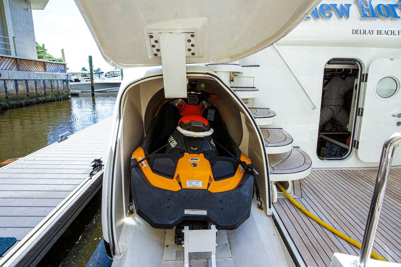 a boat with a yellow and black object on the front aboard NEW HORIZON Yacht for Sale