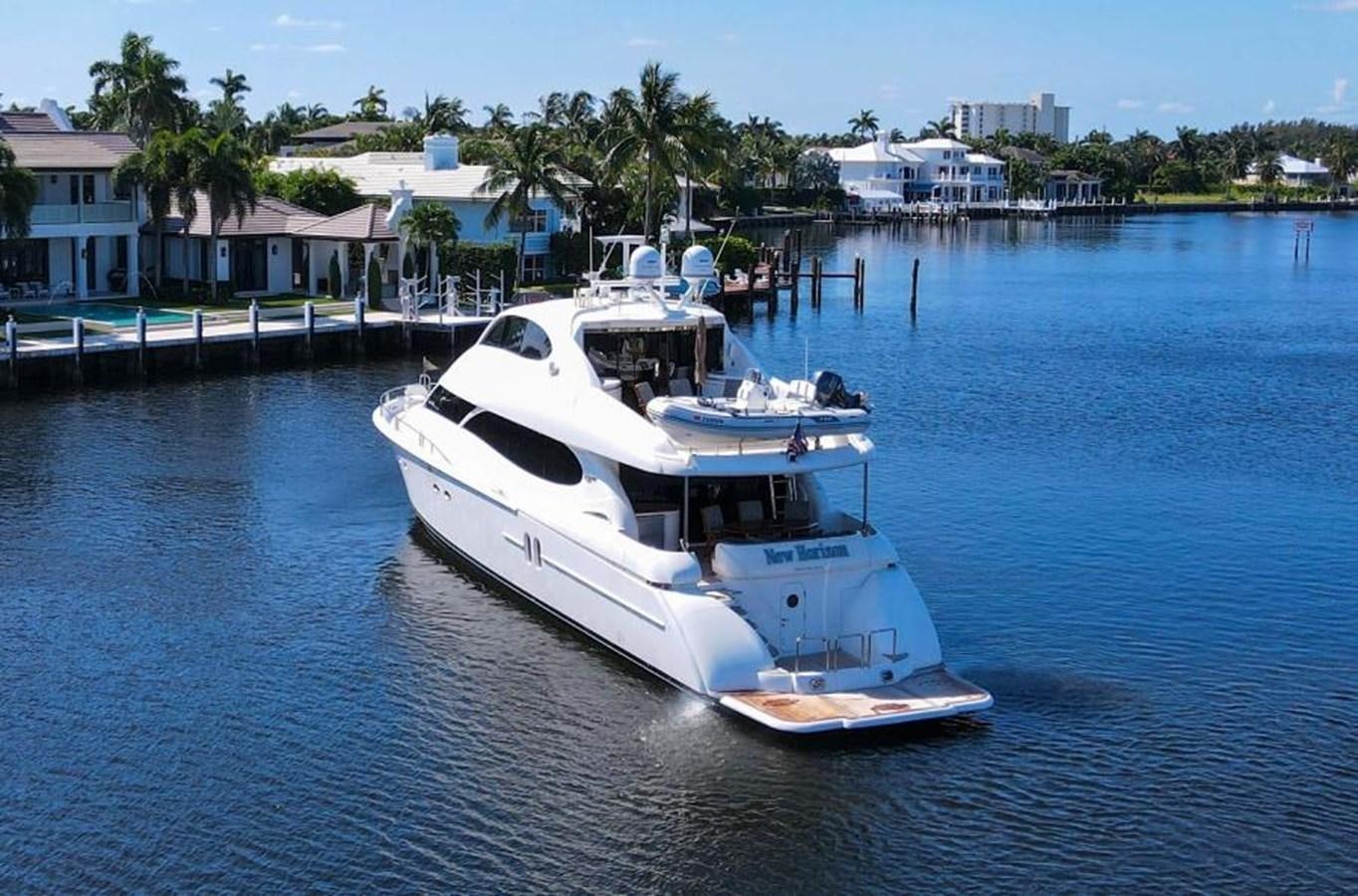 a white yacht in the water aboard NEW HORIZON Yacht for Sale