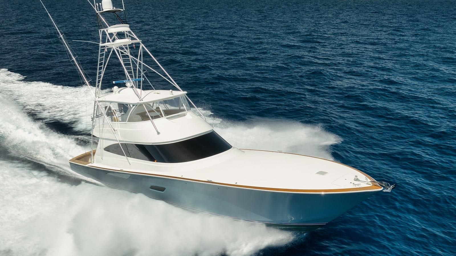 a white boat on the water aboard MVP Yacht for Sale