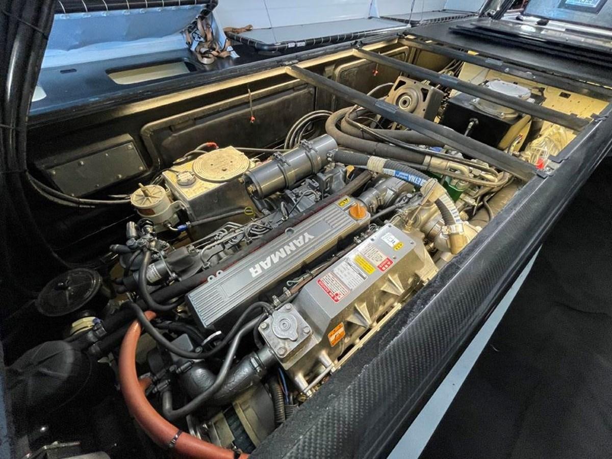 a car engine with a few parts aboard BLACK JACK IV Yacht for Sale