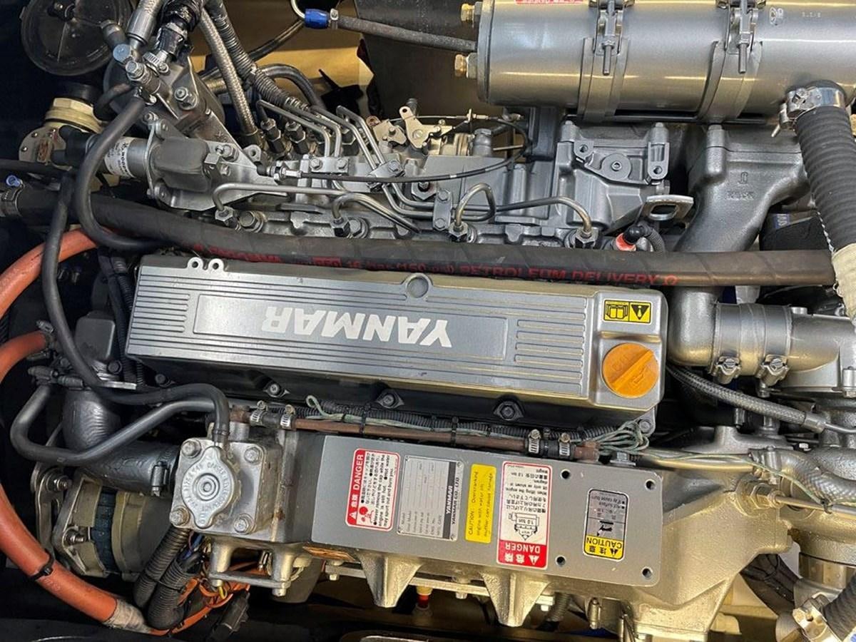a close-up of a car engine aboard BLACK JACK IV Yacht for Sale