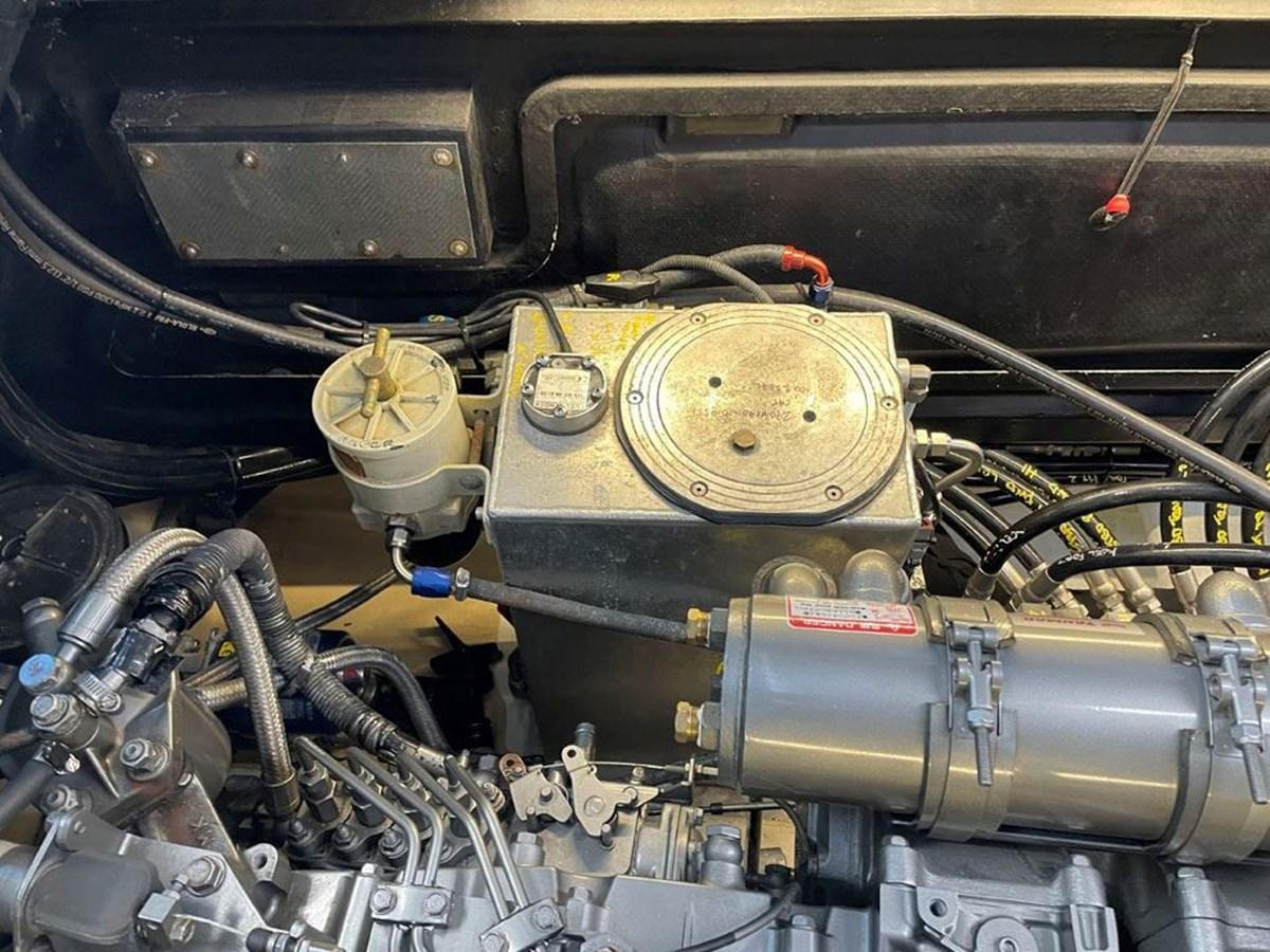 a car engine with a metal cylinder aboard BLACK JACK IV Yacht for Sale