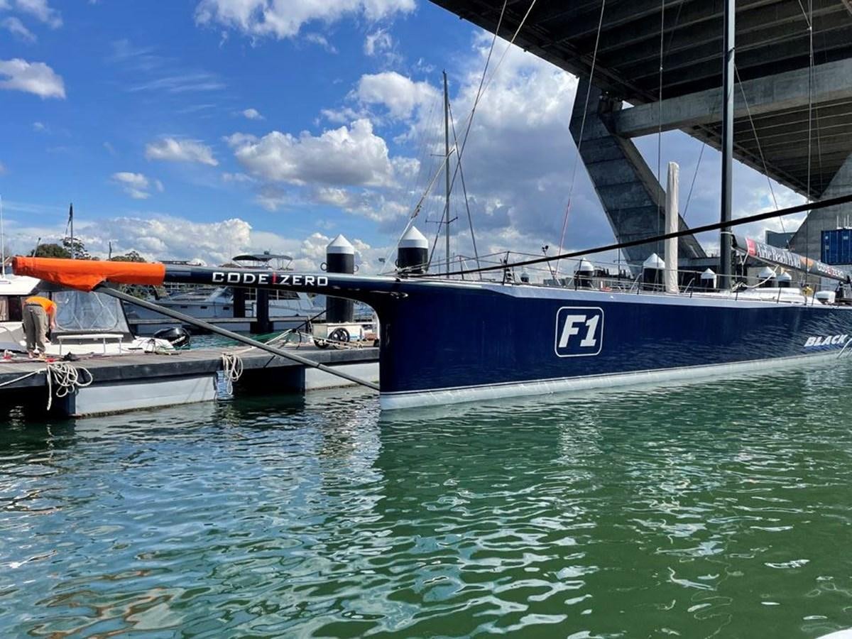 a boat docked at a pier aboard BLACK JACK IV Yacht for Sale