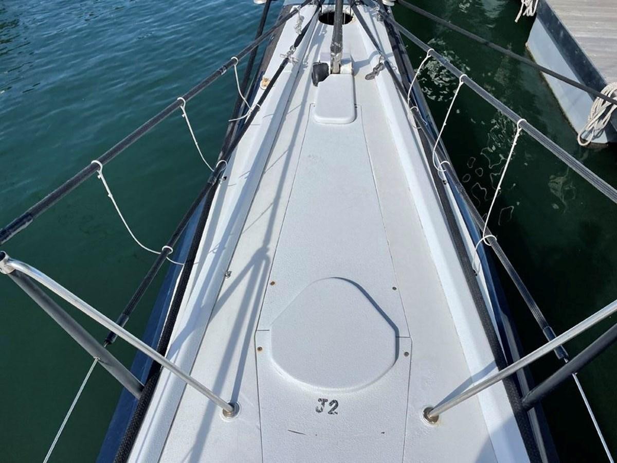 a large white boat aboard BLACK JACK IV Yacht for Sale