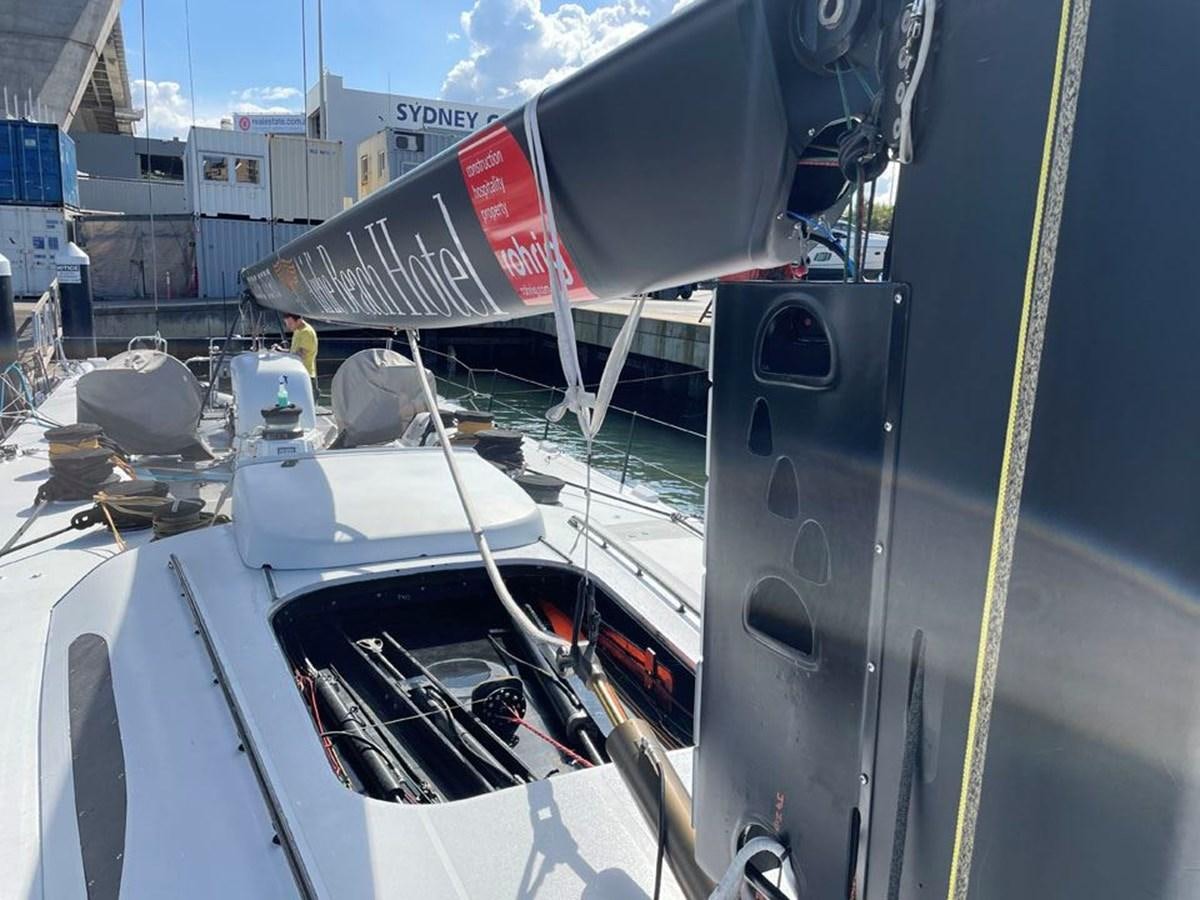 a boat with a large sail aboard BLACK JACK IV Yacht for Sale