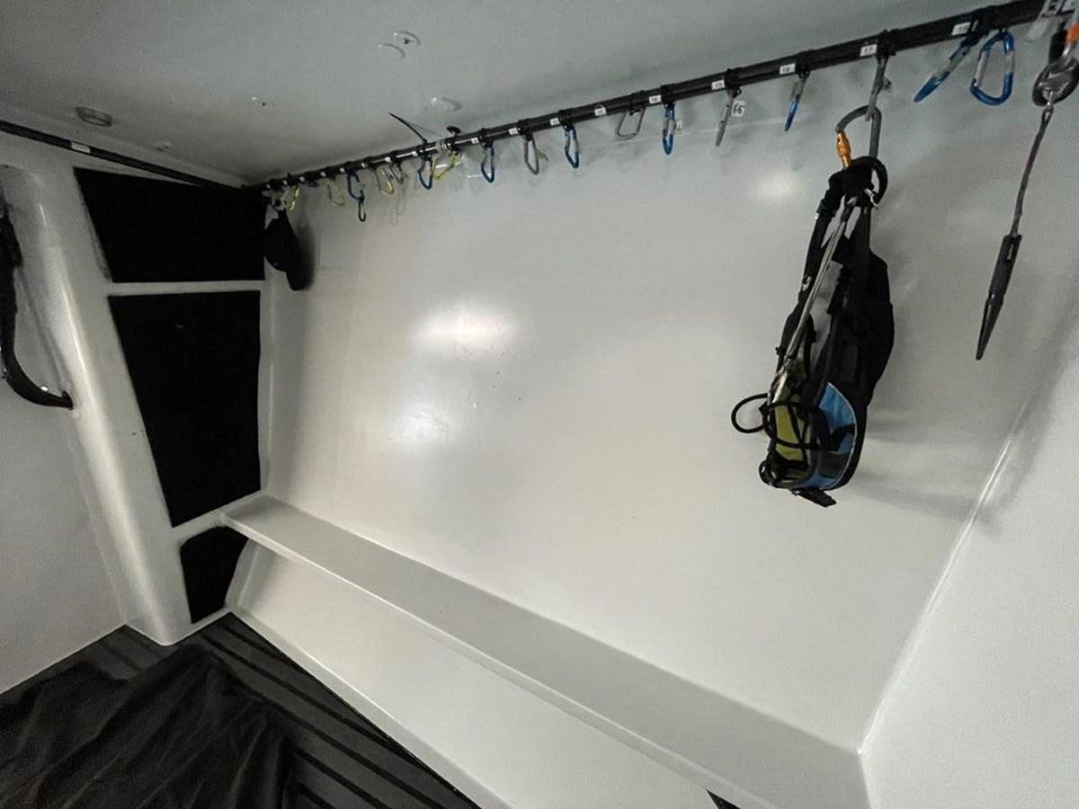 a black bag from a string aboard BLACK JACK IV Yacht for Sale