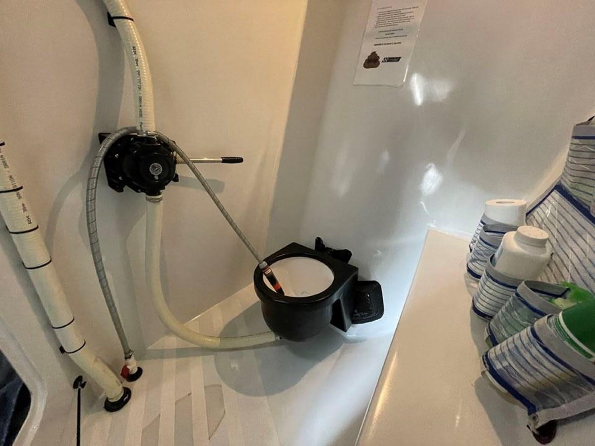 a black bucket on a counter aboard BLACK JACK IV Yacht for Sale