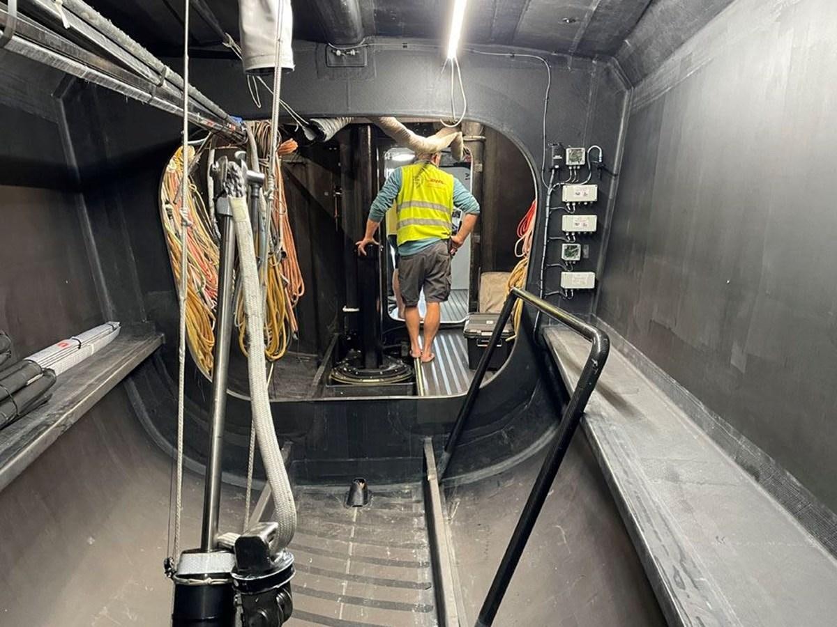 a person working in a factory aboard BLACK JACK IV Yacht for Sale