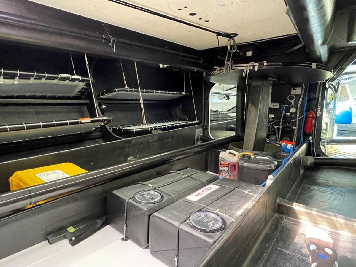 a large machine in a room aboard BLACK JACK IV Yacht for Sale