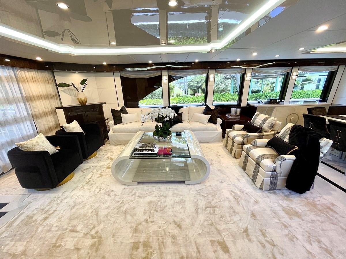 a large room with a table and chairs aboard NEW BOAT WITH FULL WARRANTIES Yacht for Sale