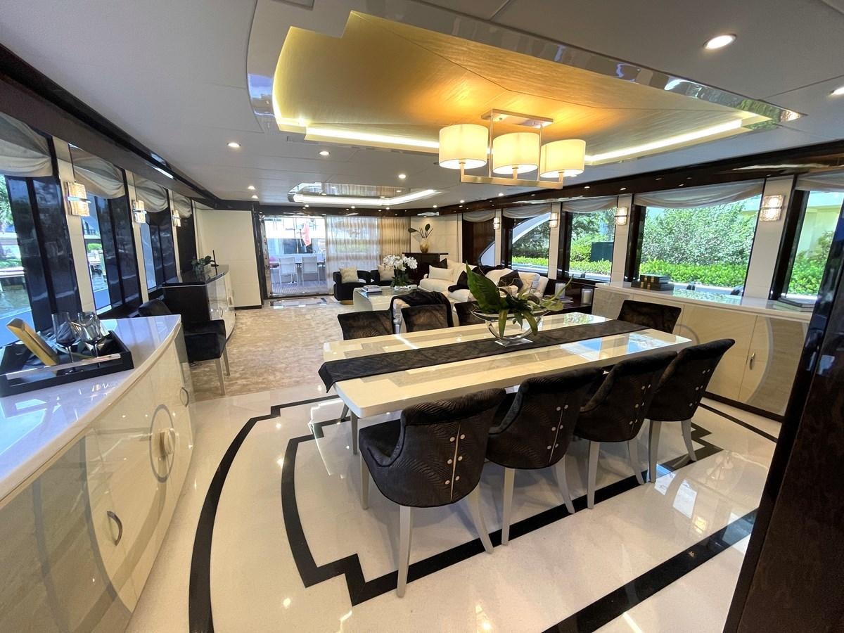 a room with a table and chairs aboard NEW BOAT WITH FULL WARRANTIES Yacht for Sale