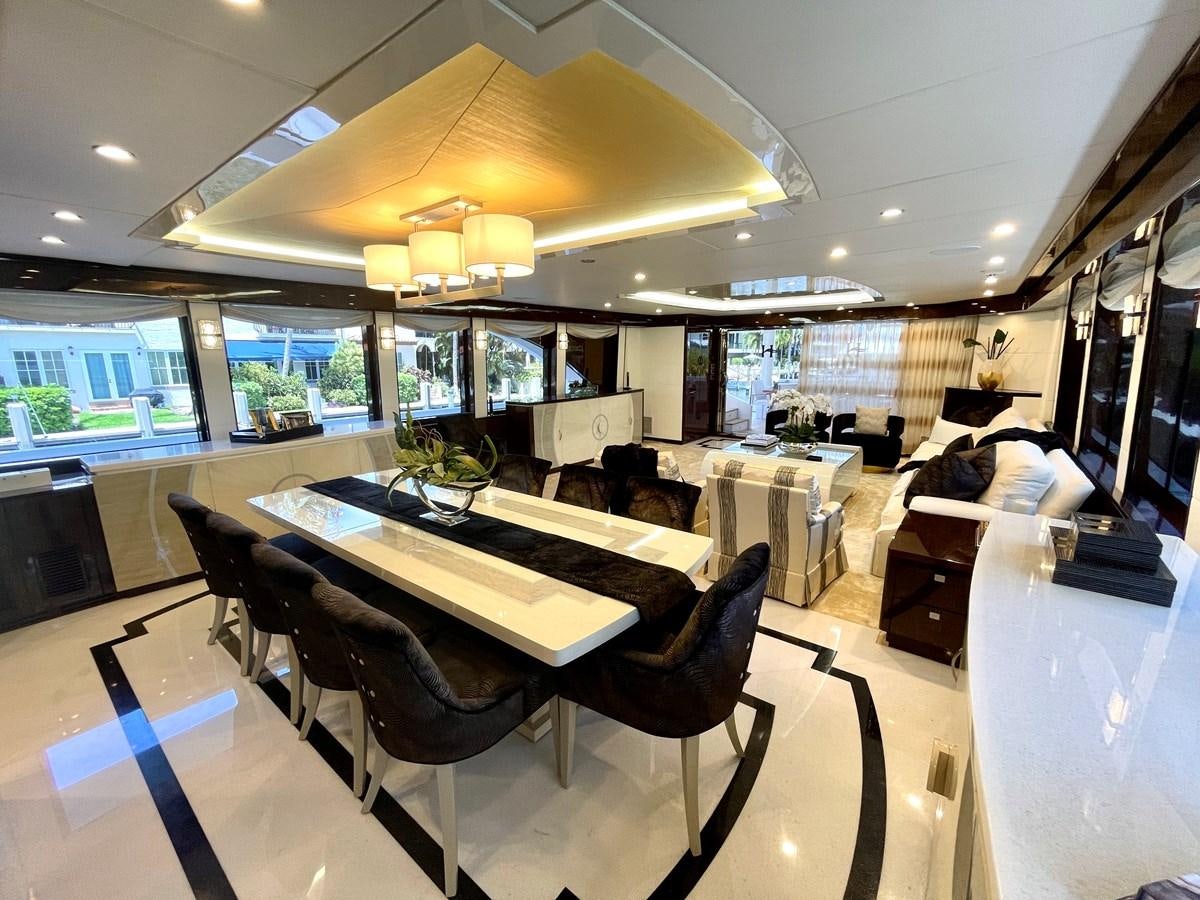 a room with a table and chairs aboard NEW BOAT WITH FULL WARRANTIES Yacht for Sale