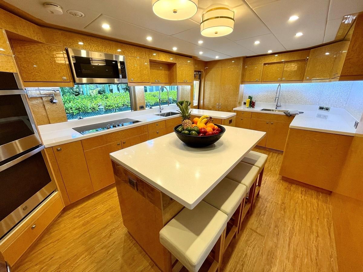 a kitchen with a bowl of fruit aboard NEW BOAT WITH FULL WARRANTIES Yacht for Sale