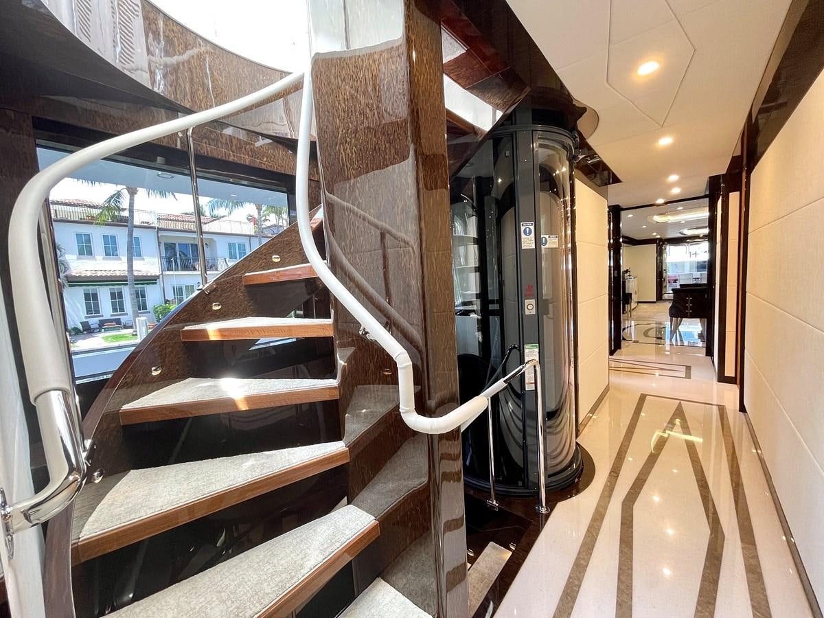 a large escalator in a building aboard NEW BOAT WITH FULL WARRANTIES Yacht for Sale