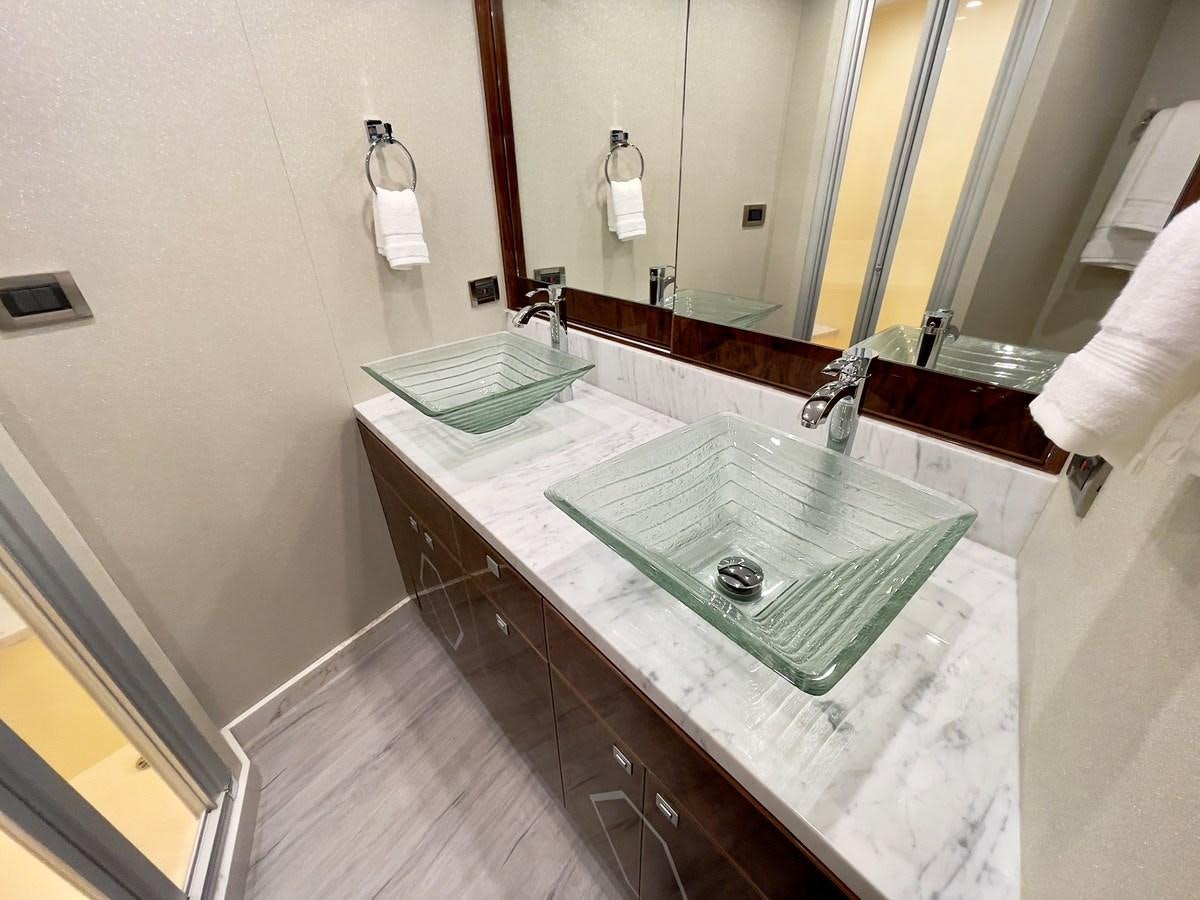 a bathroom with a glass counter aboard NEW BOAT WITH FULL WARRANTIES Yacht for Sale