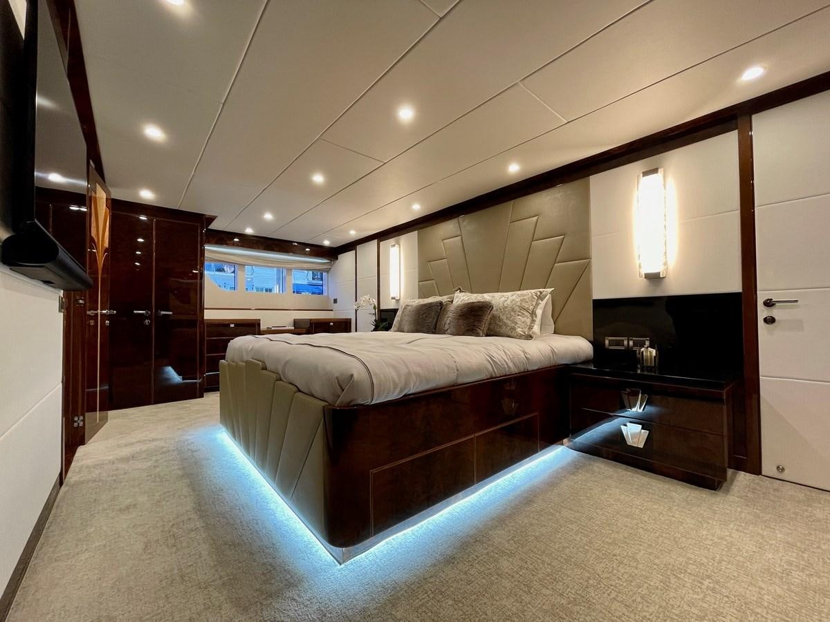 a bedroom with a bed and a desk aboard NEW BOAT WITH FULL WARRANTIES Yacht for Sale