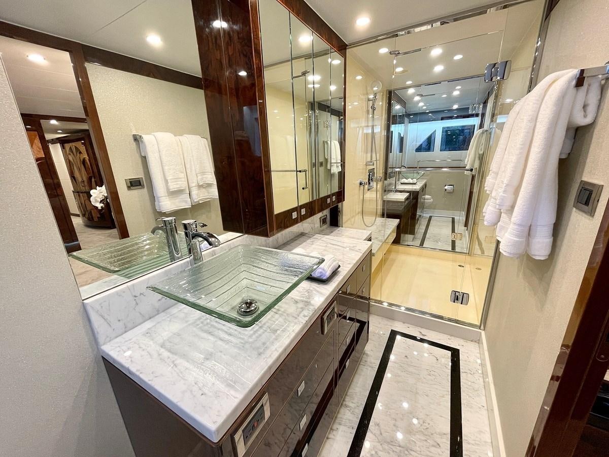 a bathroom with a large mirror aboard NEW BOAT WITH FULL WARRANTIES Yacht for Sale