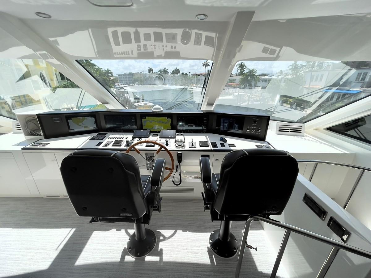 a room with a piano and chairs aboard NEW BOAT WITH FULL WARRANTIES Yacht for Sale
