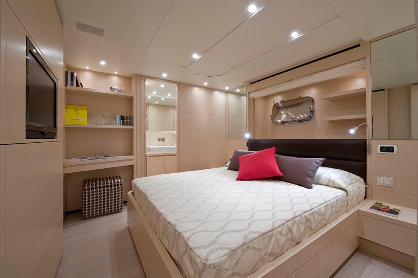 a room with a bed and a shelf aboard ELYSIUM Yacht for Sale