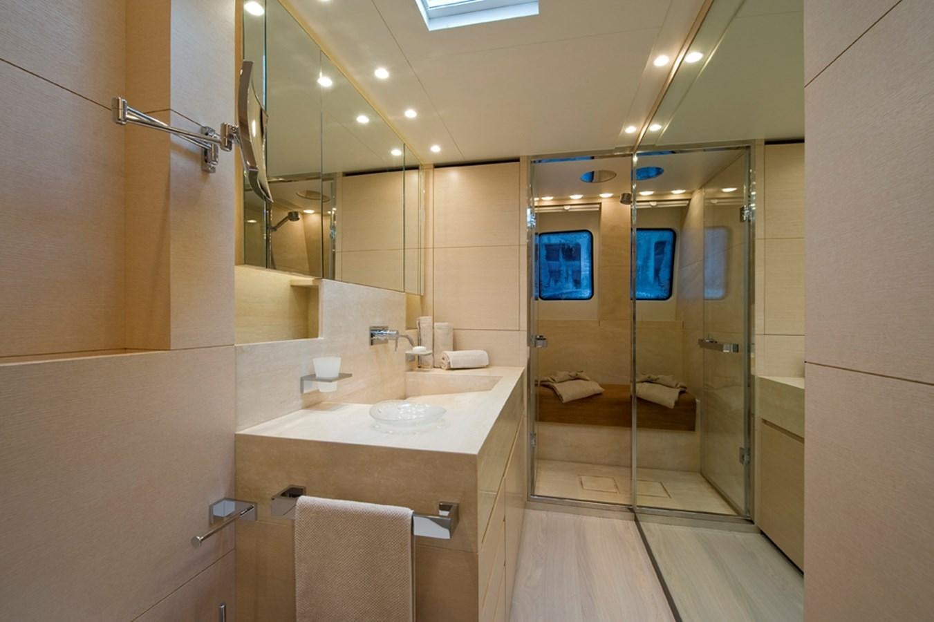 a bathroom with a sink and a mirror aboard ELYSIUM Yacht for Sale