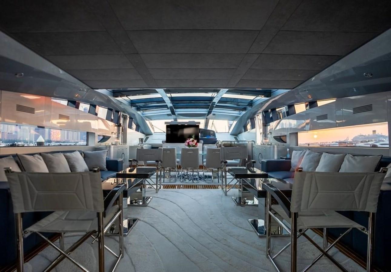 a room with chairs and tables aboard LADY MAIA Yacht for Sale