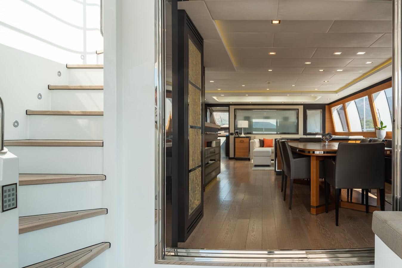 a room with a table and chairs aboard ASYA Yacht for Sale