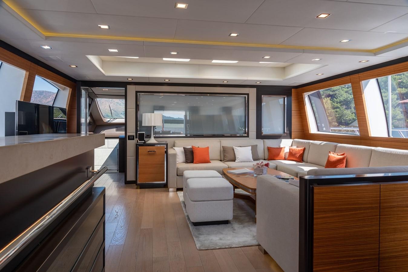 a living room with a couch and a television aboard ASYA Yacht for Sale