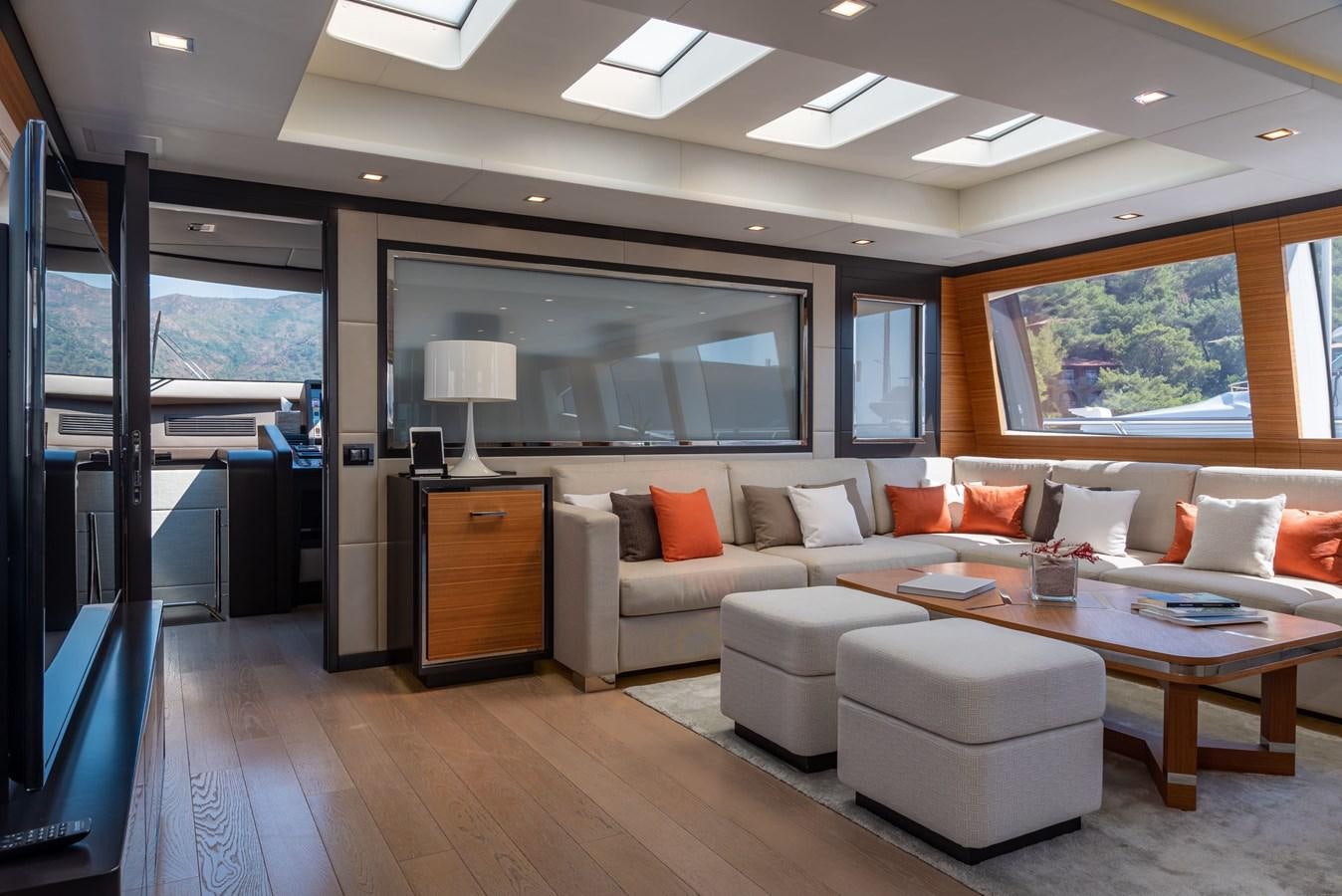 a living room with a large glass door aboard ASYA Yacht for Sale