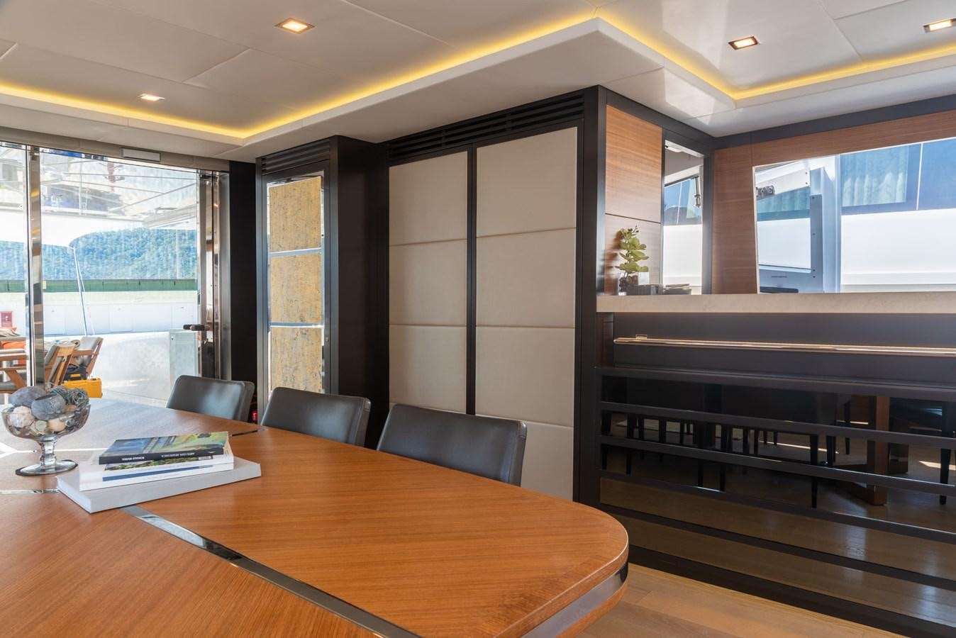 a room with a table and chairs aboard ASYA Yacht for Sale