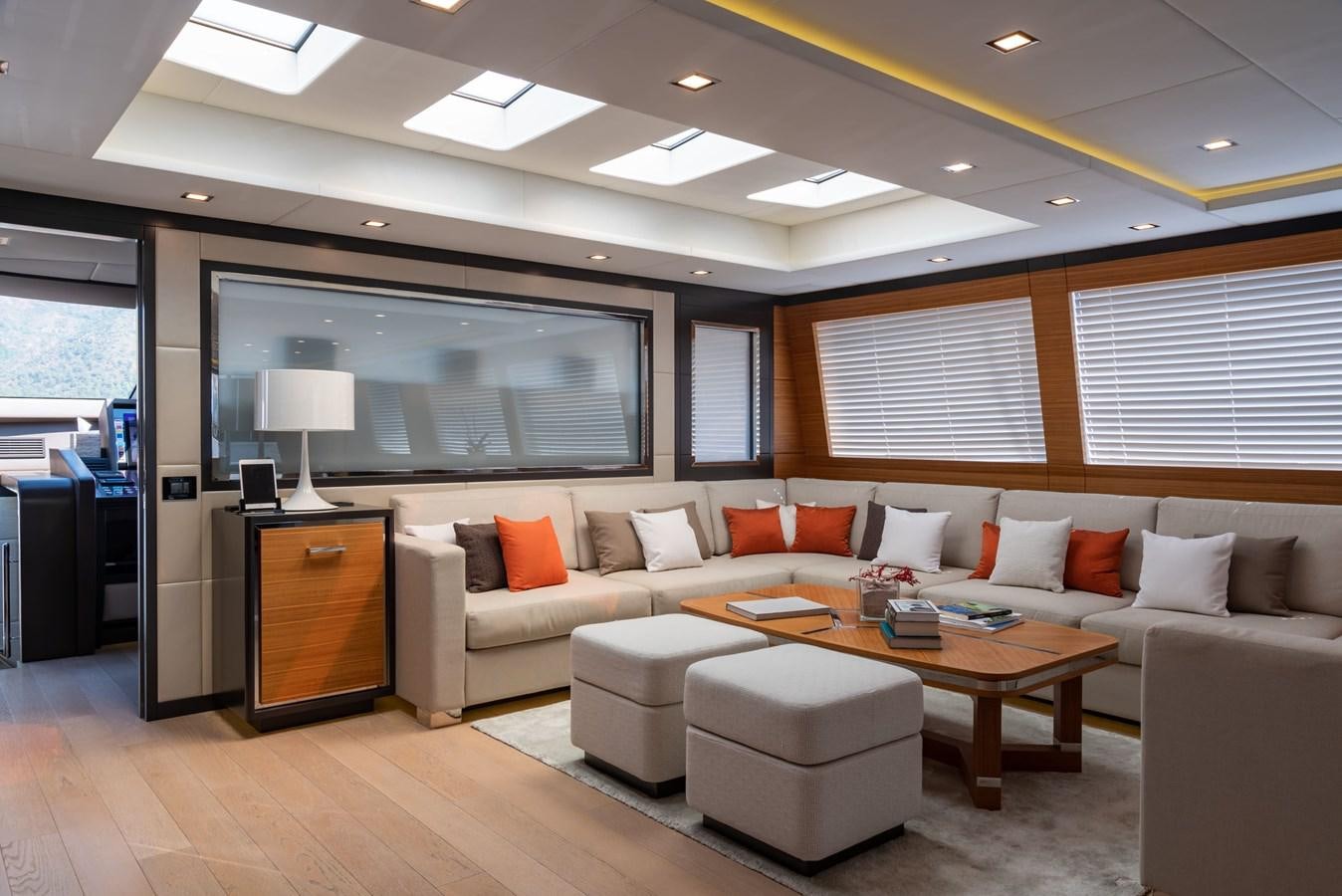 a living room with a large tv aboard ASYA Yacht for Sale