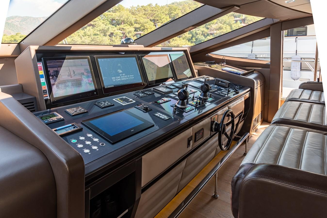 a table with many computers on it aboard ASYA Yacht for Sale