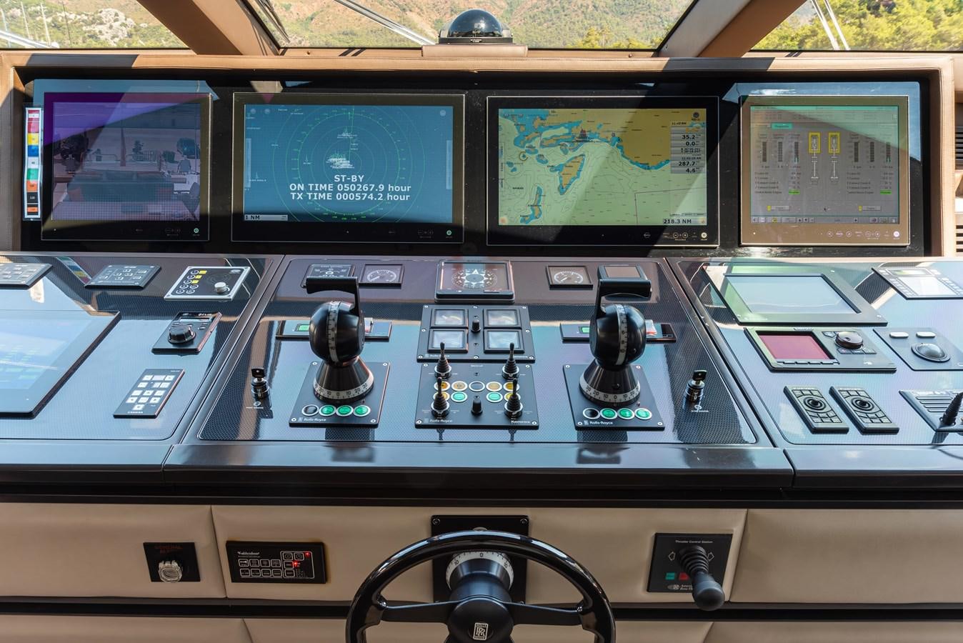 a control panel with a video game aboard ASYA Yacht for Sale
