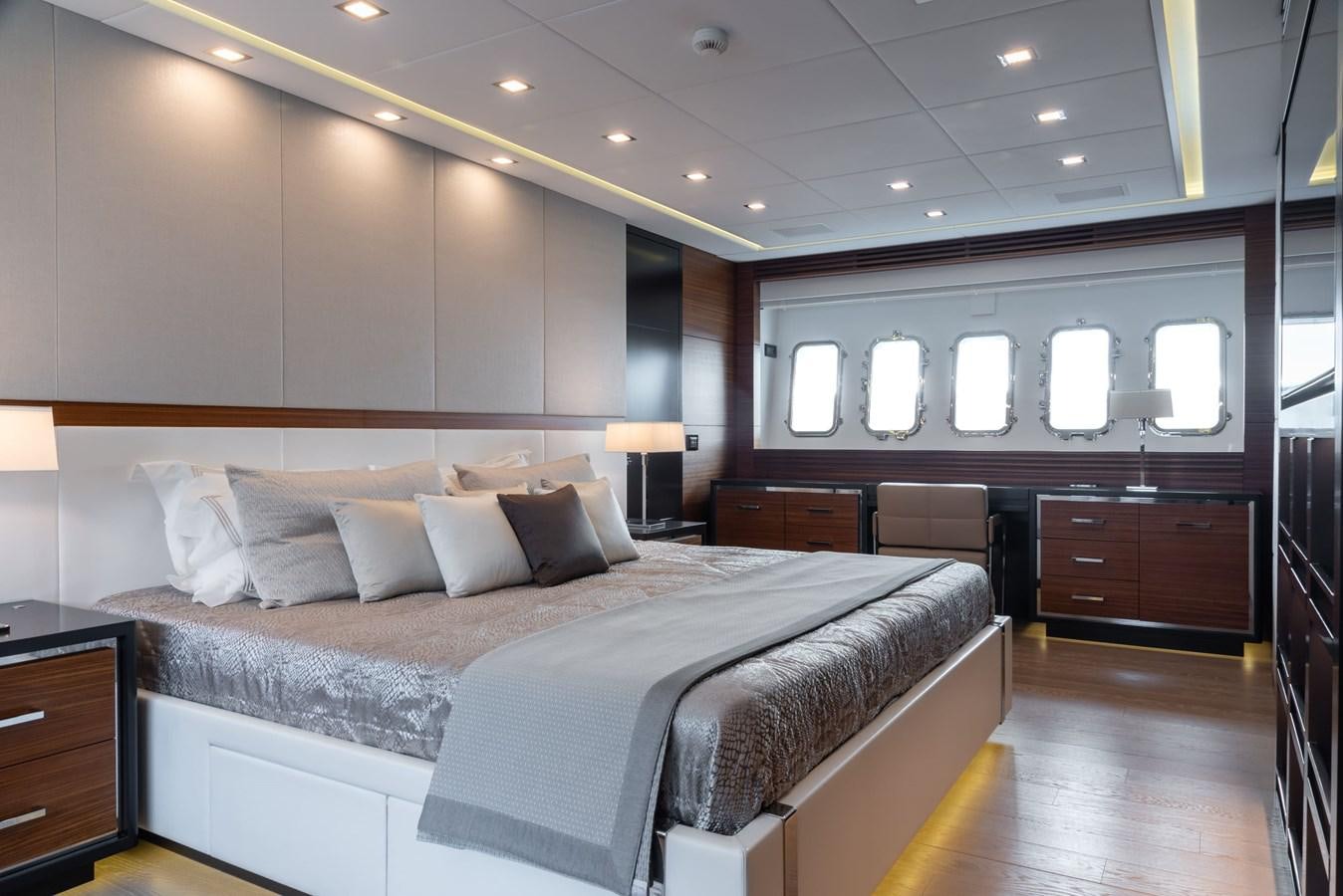 a large bed in a hotel room aboard ASYA Yacht for Sale
