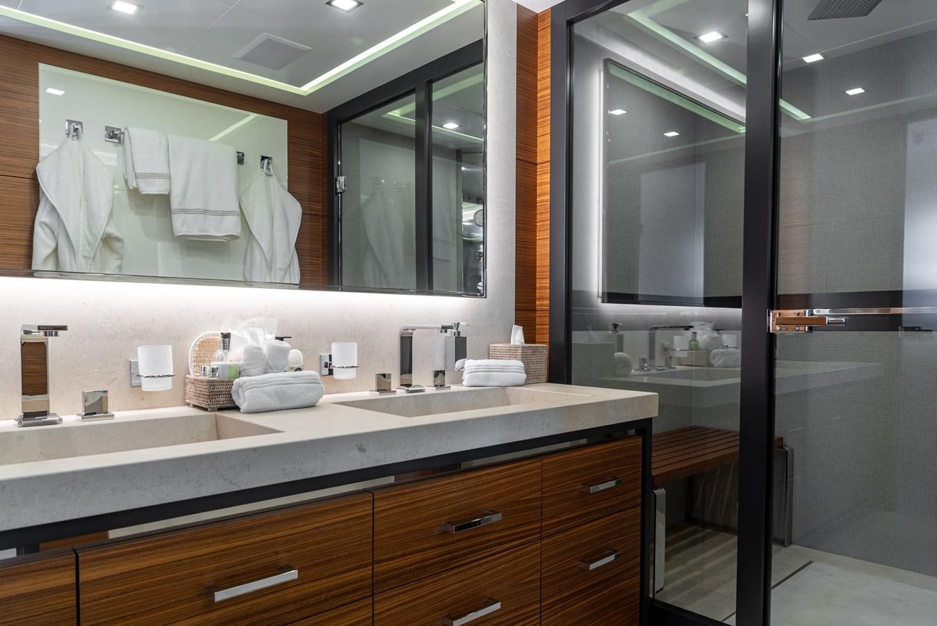 a bathroom with a large mirror aboard ASYA Yacht for Sale