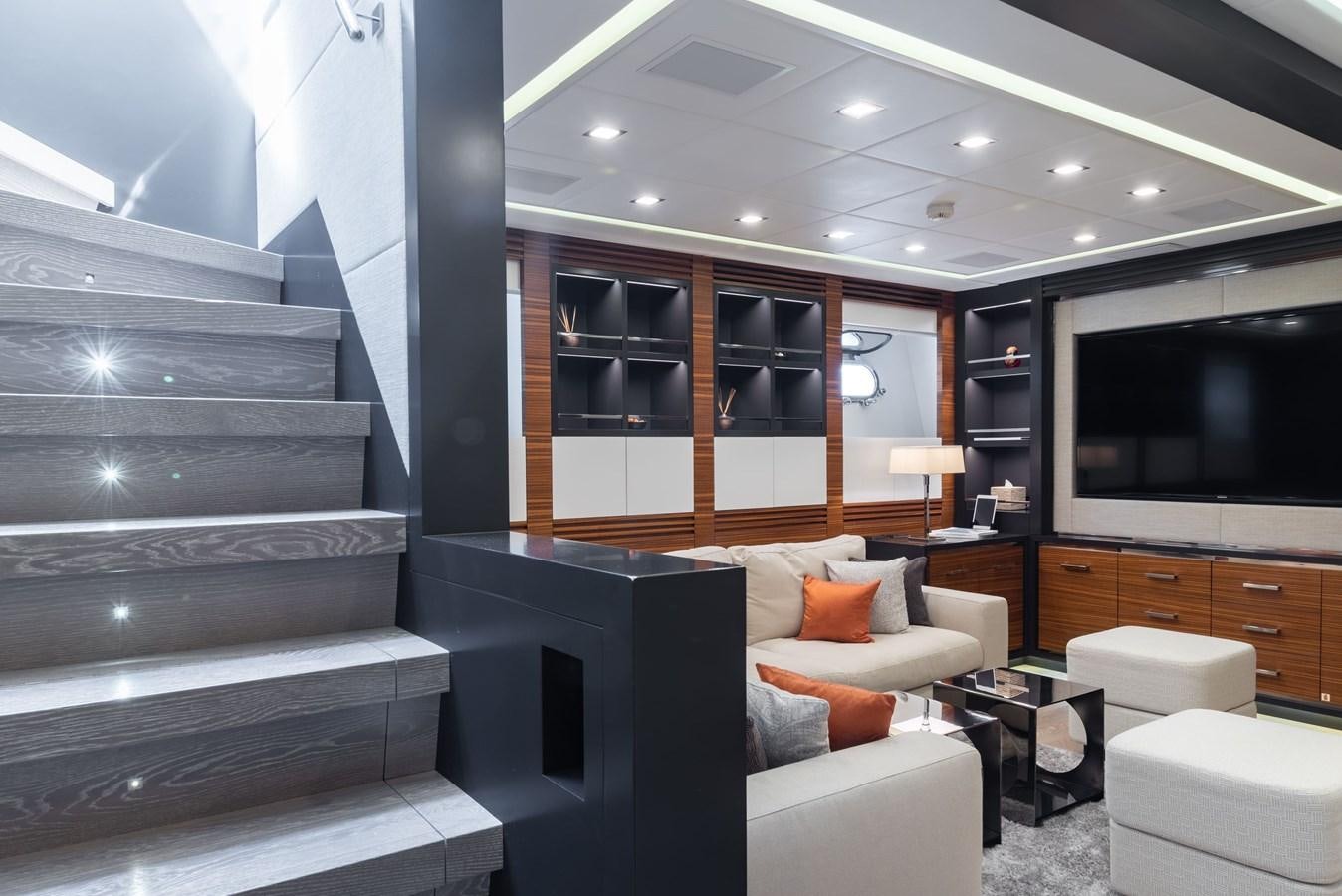 a living room with a staircase aboard ASYA Yacht for Sale