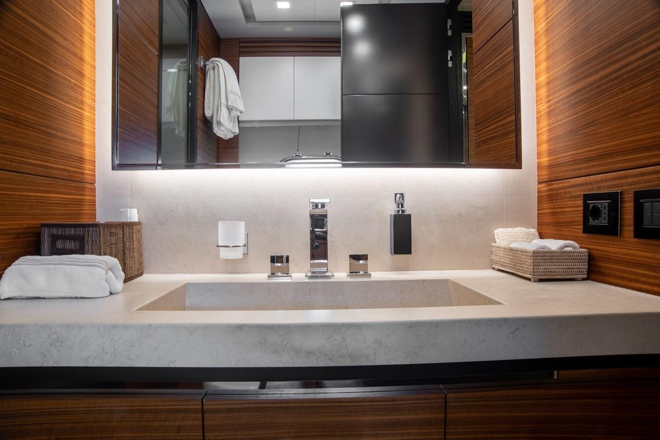 a bathroom with a large mirror aboard ASYA Yacht for Sale