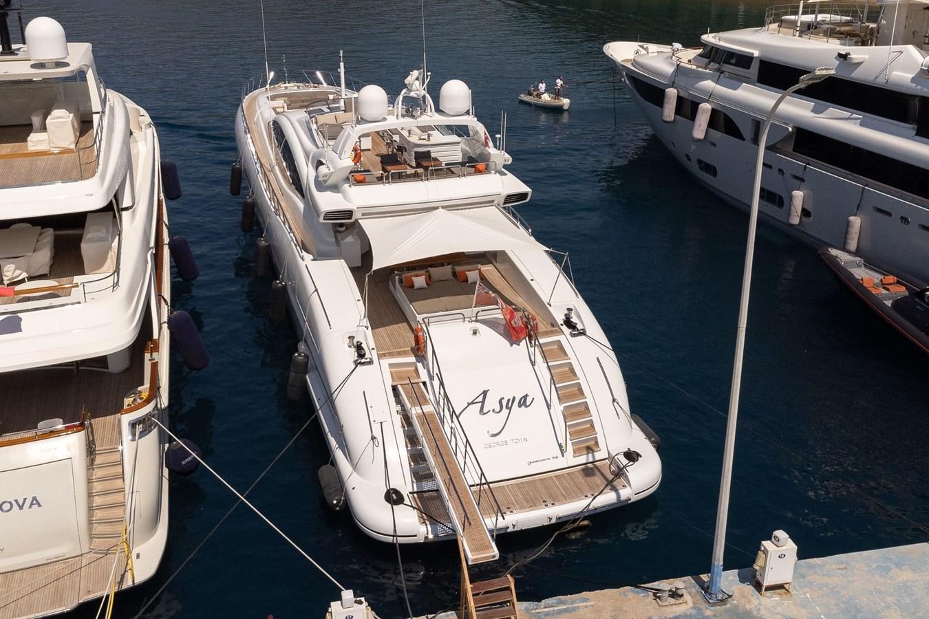 a boat docked at a pier aboard ASYA Yacht for Sale