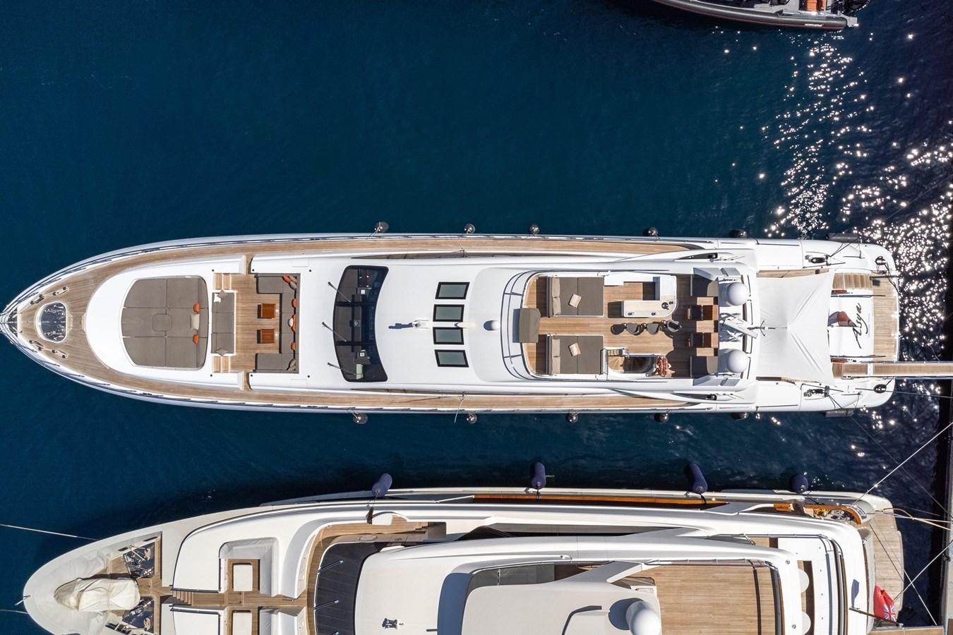 a large white boat on a body of water aboard ASYA Yacht for Sale