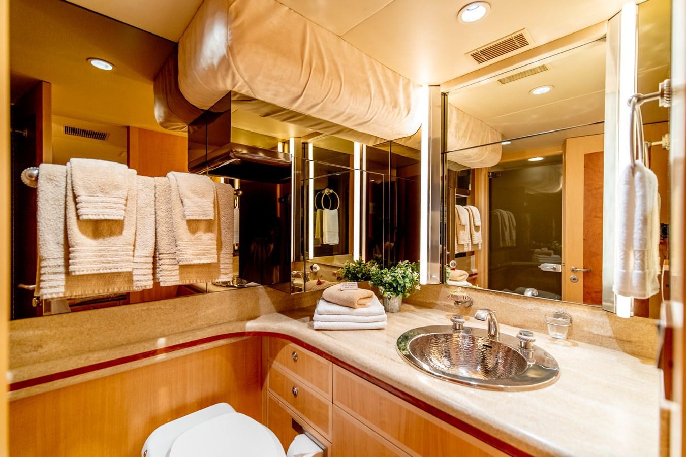 a bathroom with a large mirror aboard SHADOWFAX Yacht for Sale