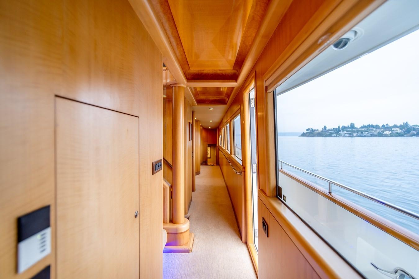 a room with a window and a view of the water aboard SHADOWFAX Yacht for Sale
