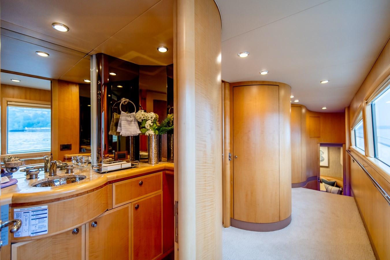 a bathroom with a large mirror aboard SHADOWFAX Yacht for Sale